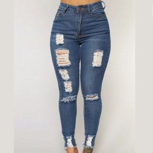 Distressed high waisted denim jeans
